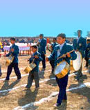Maharishi Vidya Mandir marching band on the track