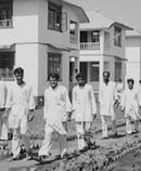 Vedic Pandits walking near their Vastu housing